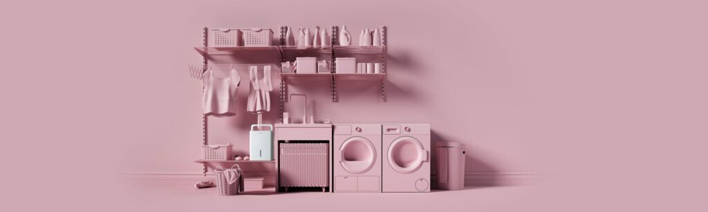 Vaskerom med vaskemaskin og tørketrommel. Alt er rosa.